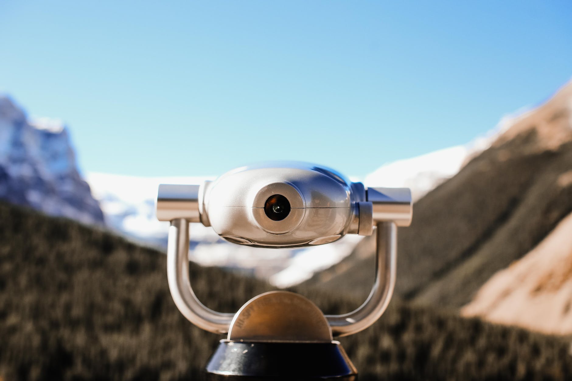 close up of binoculars on mountain landscape